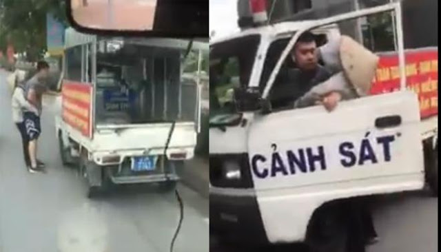 Kỷ luật cảnh cáo công an mặc quần đùi lái xe biển xanh dẹp hàng rong Kỷ luật cảnh cáo công an mặc quần đùi lái xe biển xanh dẹp hàng rong