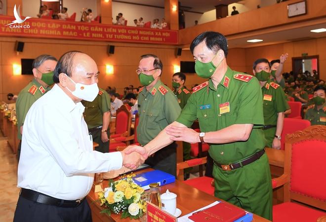 Chủ tịch nước Nguyễn Xuân Phúc dự Hội nghị sơ kết công tác Công an 6 tháng đầu năm 2021